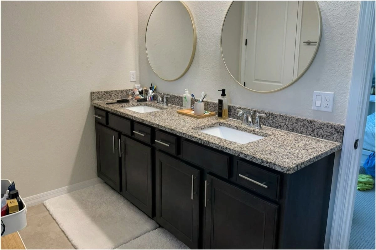 Bright white bathroom after house cleaning service in Espoo