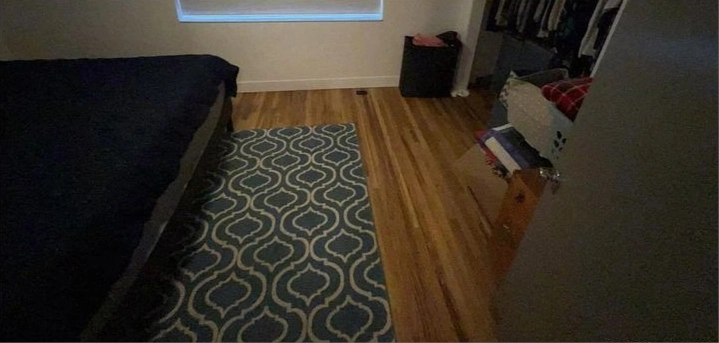 Neat bedroom after professional cleaning service in Espoo