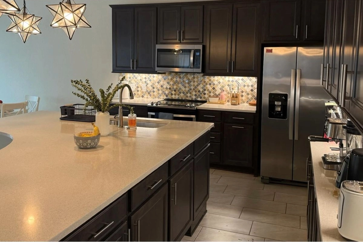 Polished stovetop after professional cleaning in Espoo