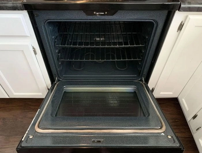 Spotless oven after professional house cleaning in Espoo